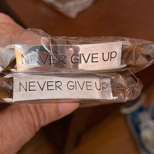 “Never Give Up” Silver on Leather Strap. NEW in …